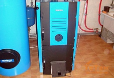 Частный дом 300 м² с твердотопливным котлом